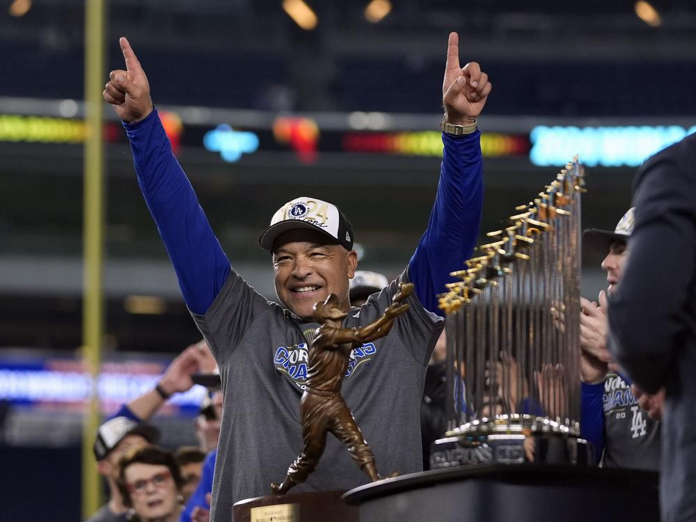 Los Angeles Dodgers manager Dave Roberts celebrates after the Dodgers beat New York Yankees in Game 5 to win the baseball World Series, Thursday, Oct. 31, 2024, in New York.
