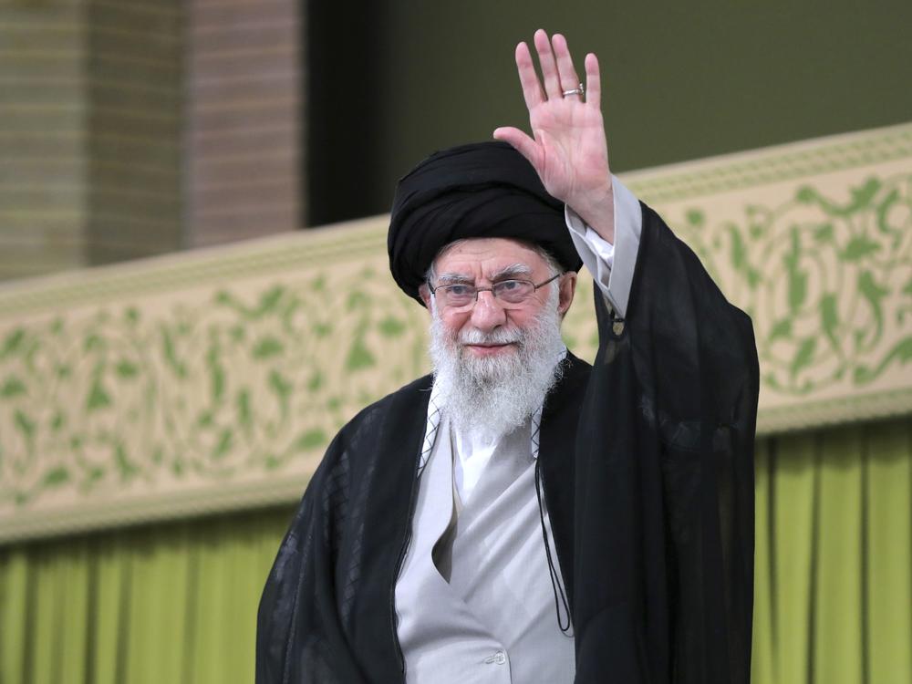 In this photo released by an official website of the office of the Iranian supreme leader, Supreme Leader Ayatollah Ali Khamenei waves to the crowd during a meeting with school and university students, in Tehran on Saturday.