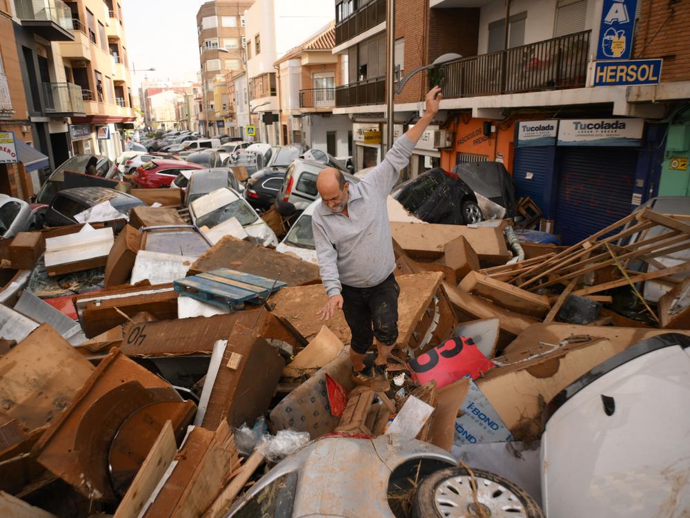 Hundreds are dead in Spain's floods. Scientists see a connection to