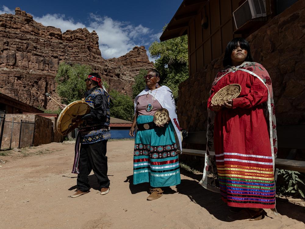 From left, Matthew Putesoy Senior, Fanny Putesoy and Shaylene putesoy, ready to perform a traditional dance at the Supai Tribe village.