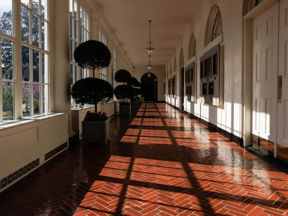 The East Colonnade, with digital displays under the archways on the right.