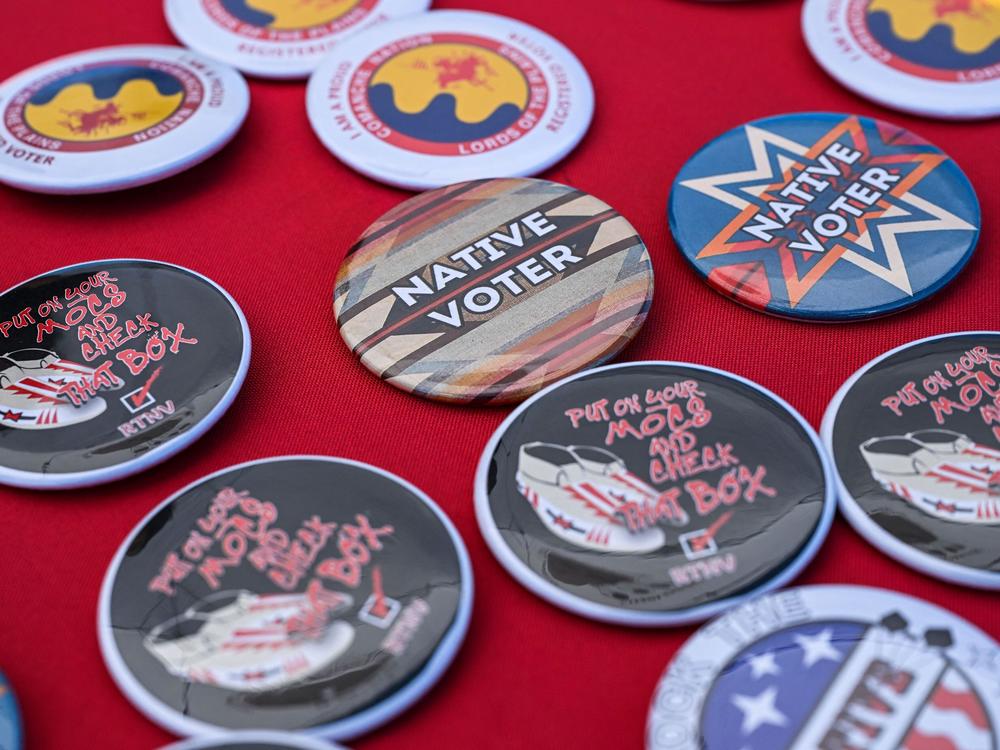 Pins are pictured at a counter during a cultural meeting at the Comanche Nation fairgrounds in Lawton, Okla., in September 2023.
