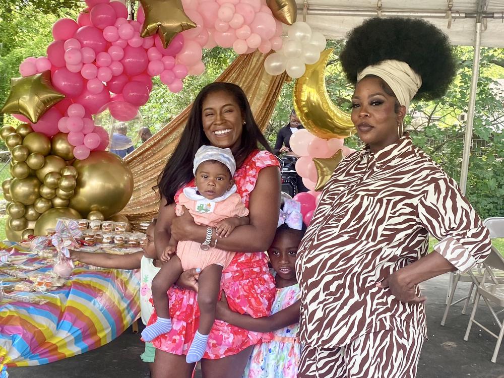 Nancy Davis (right) at her baby shower in Baton Rouge, LA on Apr. 28, 2024.  Her friend and fellow activist Kaitlyn Joshua (left) came to celebrate, along with her infant son Liam, and daughter Lauryn.
