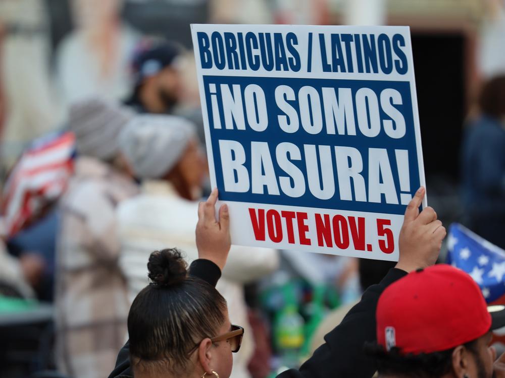 A woman holds a sign at a rally organized by the Democratic Party in Reading, Pa., on Saturday.