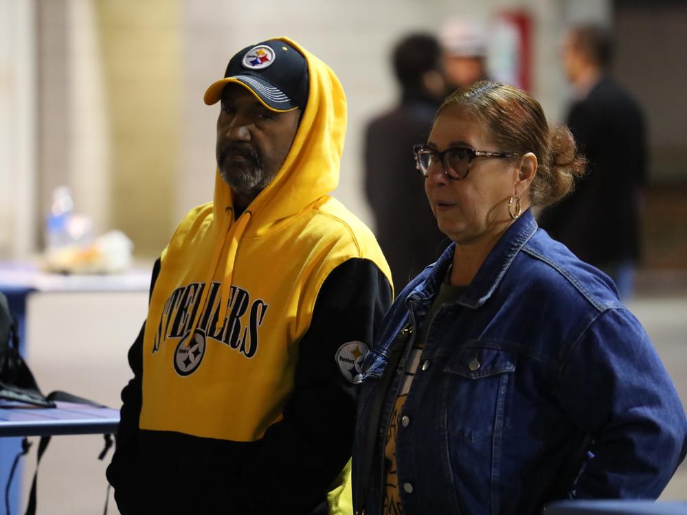 Osvaldo and Eva Clemente attend a rally organized by the Democratic Party in Reading, Pa., on Saturday.