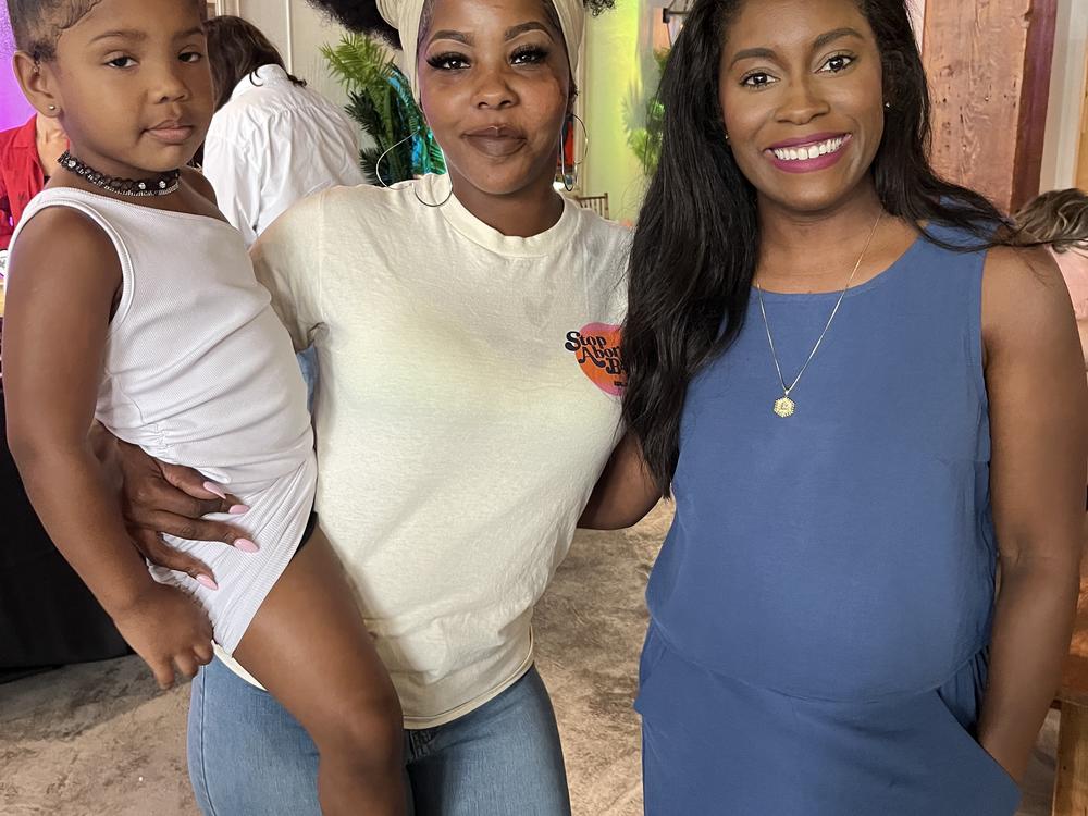 Nancy Davis (left) with her daughter Summer, and Kaitlyn Johsua during a Free & Just event for reproductive freedom in New Orleans, LA, on Oct. 14, 2024.