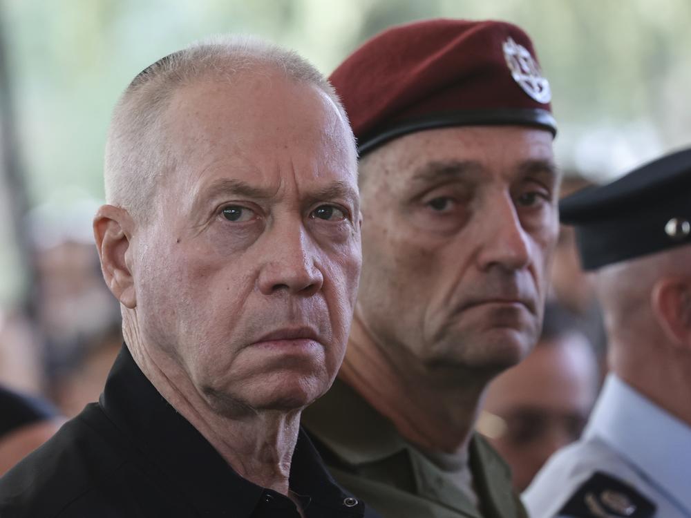 Israeli Defense Minister Yoav Gallant (left) and Chief of the General Staff Lt. Gen. Herzi Halevi attend a ceremony marking the Hebrew calendar anniversary of the Hamas attack on Oct. 7 last year that sparked the ongoing war in Gaza, at the Mount Herzl military cemetery in Jerusalem, on Oct. 27, 2024.