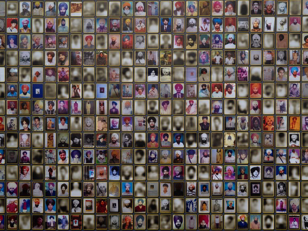 A mural at the California Capitol comprised of photos of the victims of the 1984 Sikh massacre.