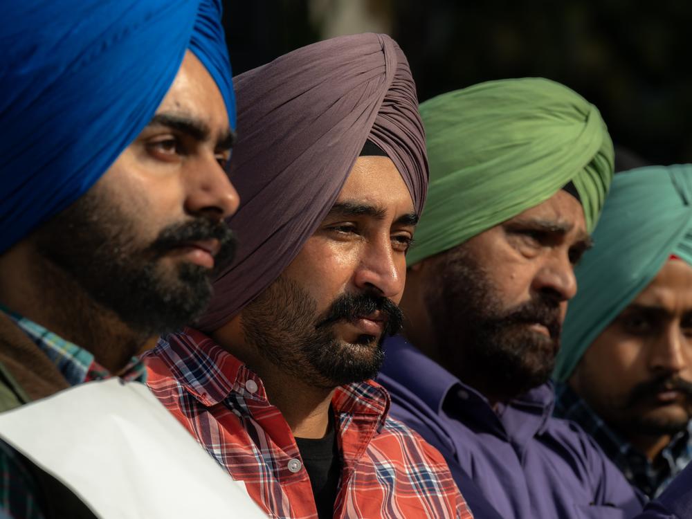 Members of the Sikh community pray at the closing event of a march hundreds of miles long from Bakersfield to Sacramento, Calif. Friday.
