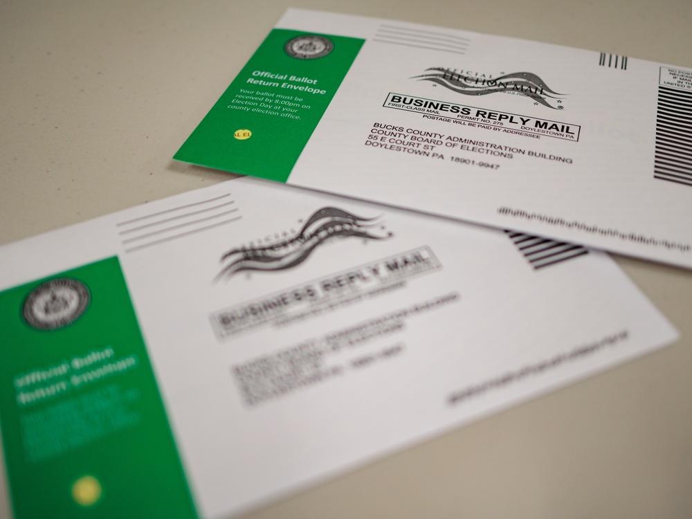 Mail-in ballots are displayed during a processing demonstration on Sept. 30 at the Bucks County Board of Elections office in Doylestown, Pa. Across Pennsylvania, more than 4,000 mail ballot challenges have been filed, mainly against overseas voters.
