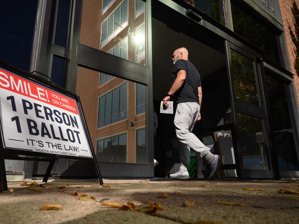 A voter enters the Bucks County Administration building in Doylestown, Pa. on Oct. 31, 2024.