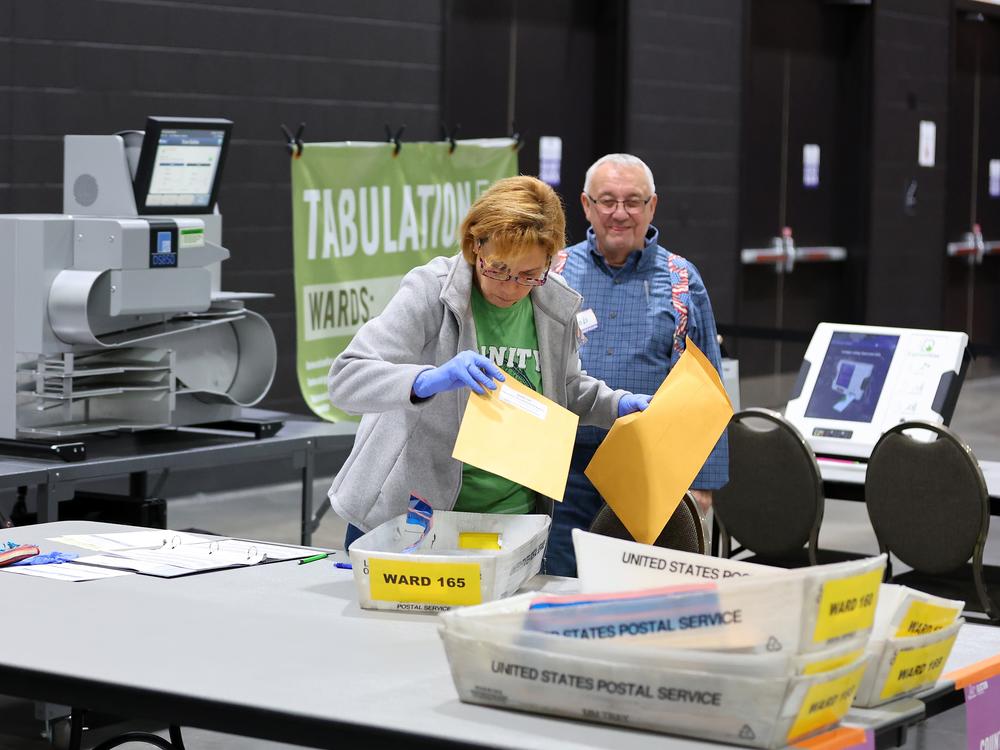 Workers count ballots at the Baird Center in Milwaukee, Wisconsin on Tuesday.