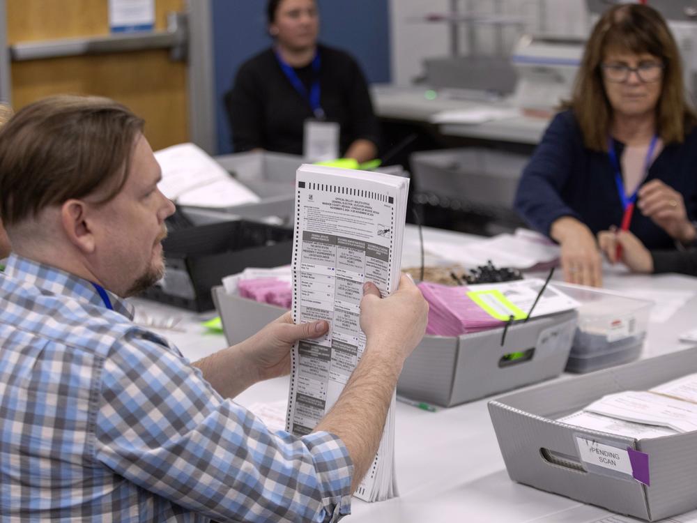 Election workers sort ballots last week at the Registrar of Voters Office in Reno, in Nevada's Washoe County.
