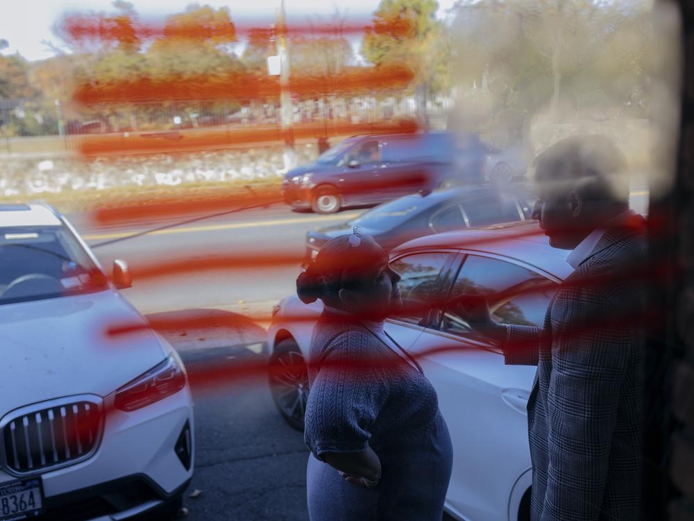 Republican supporters briefly chat outside the Staten Island Republican Party headquarters in the New Dorp neighborhood of Staten Island in New York City on Tuesday.