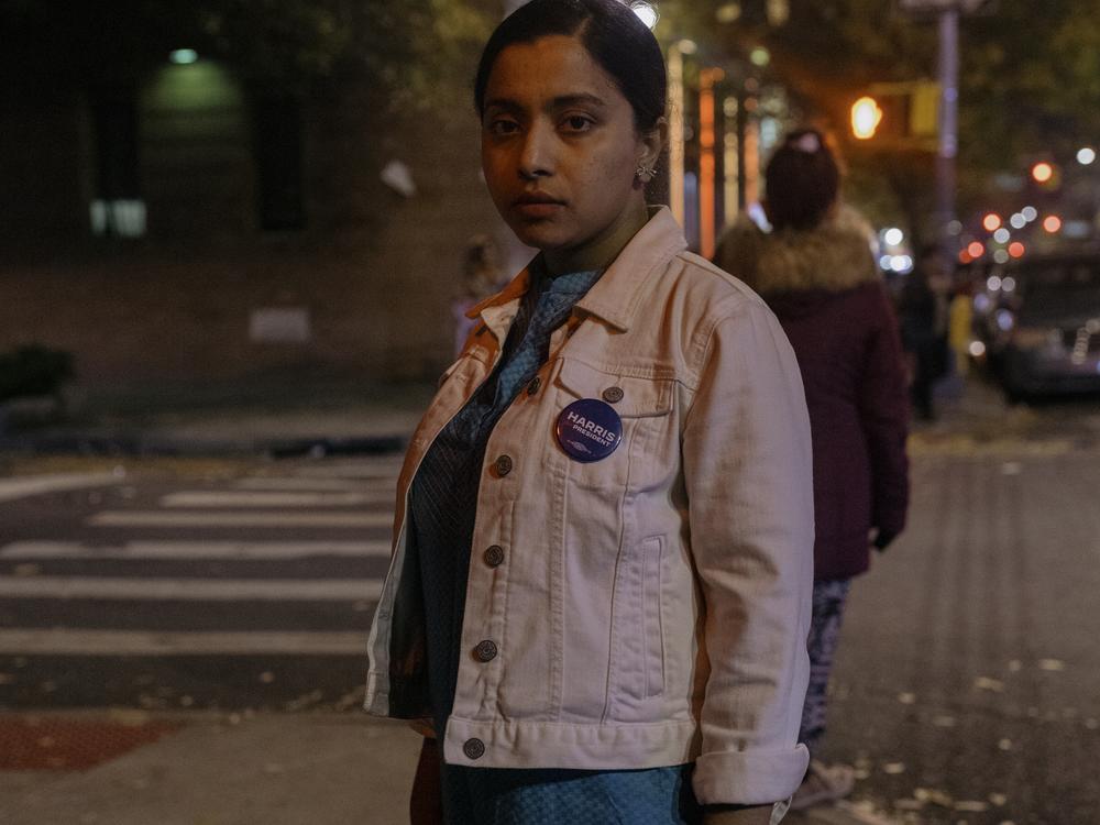 Prita Rozario, 30, a Hells Kitchen resident that is volunteering to help inform Jackson Heights voters of proposals on their ballot, stands for a portrait.