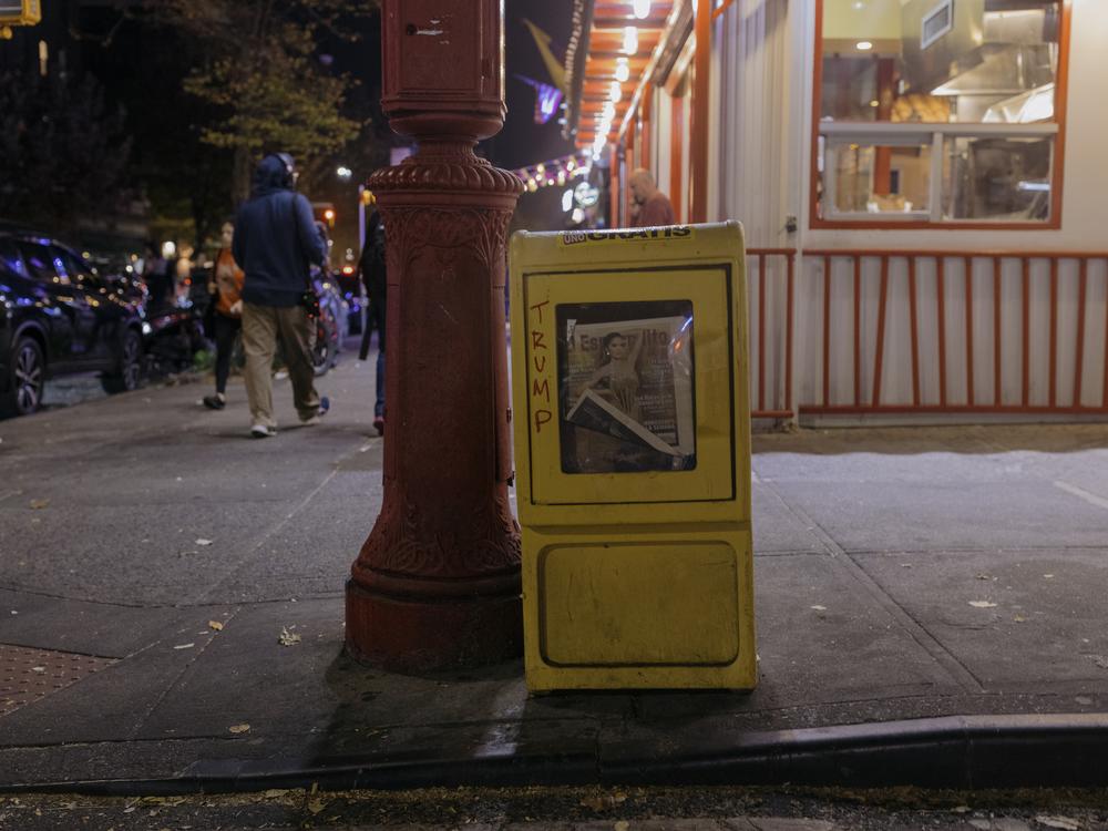 Graffiti in support of Donald Trump greets Jackson Heights residents on the corner of 37th Avenue and 83rd Street in Queens.