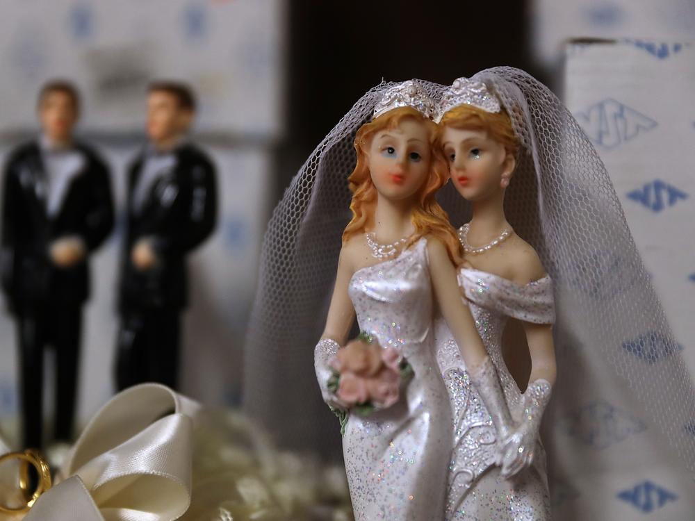 Same-sex marriage cake toppers are displayed on a shelf at Fantastico on December 5, 2017 in San Francisco, California. The U.S. Supreme Court is hearing a civil rights case over a Colorado baker's refusal to make a wedding cake for a same-sex couple.