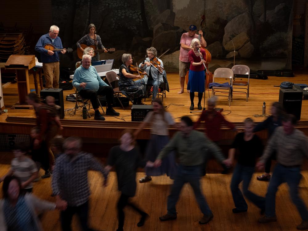 People dance during the election night square dance in Townshend, Vt.