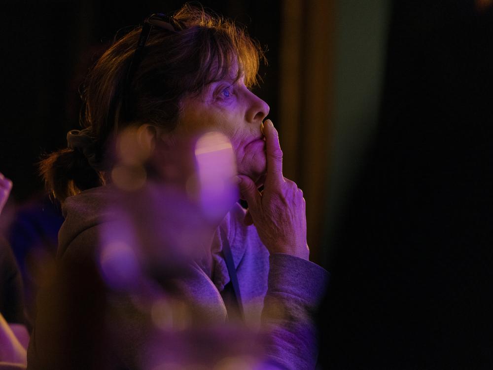 Residents of the Jackson Heights neighborhood anxiously look on for the evening’s election results during an election night watch party in Terraza 7 in Queens in New York City.