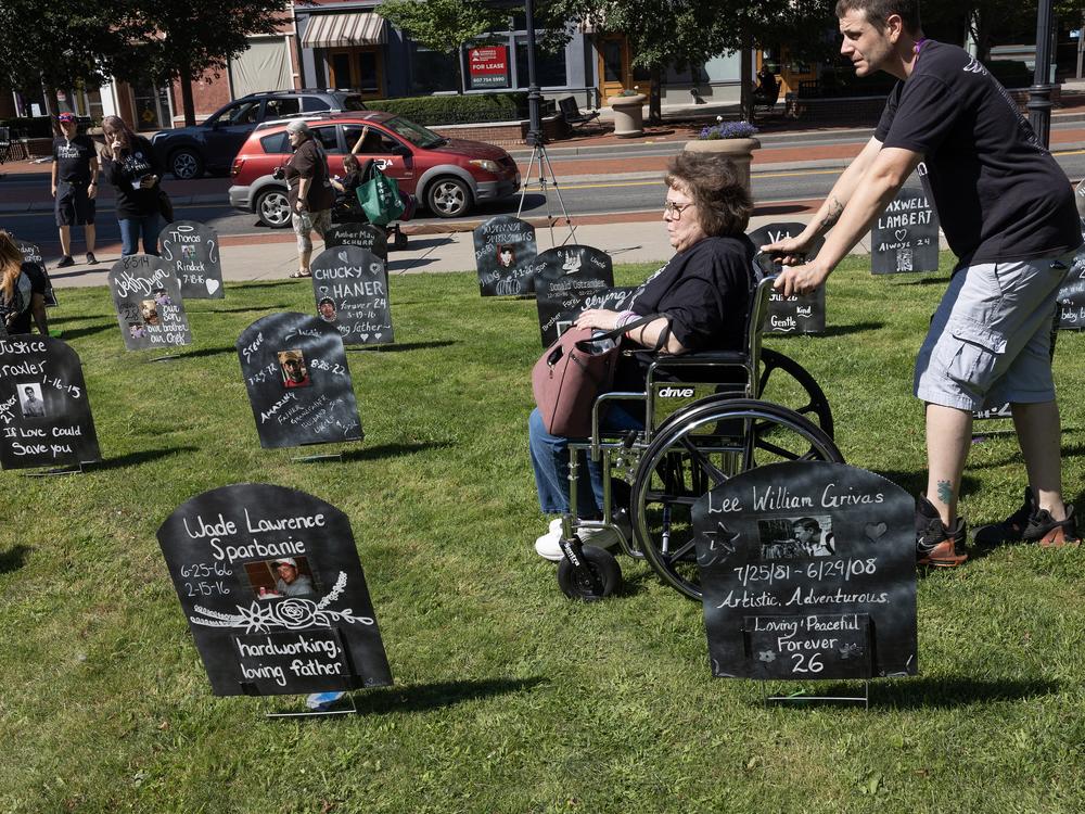 A public art memorial project honors victims of the opioid crisis in Binghamton, New York, in August 2023. Money from opioid lawsuit settlements is now flowing to states and municipalities, but the accounting is uneven.