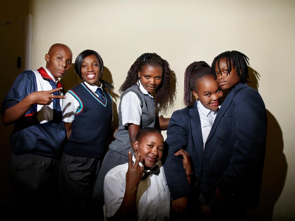 Ntombozuko 'Nozuko' Ndlwana (from left), Thozama, Nana, Zintle, Hlomela Msesele and Tsidi Zondi (in front) pose for a photo backstage during the Miss Lesbian beauty pageant in the Khayelitsha township of Cape Town, South Africa, in 2012.