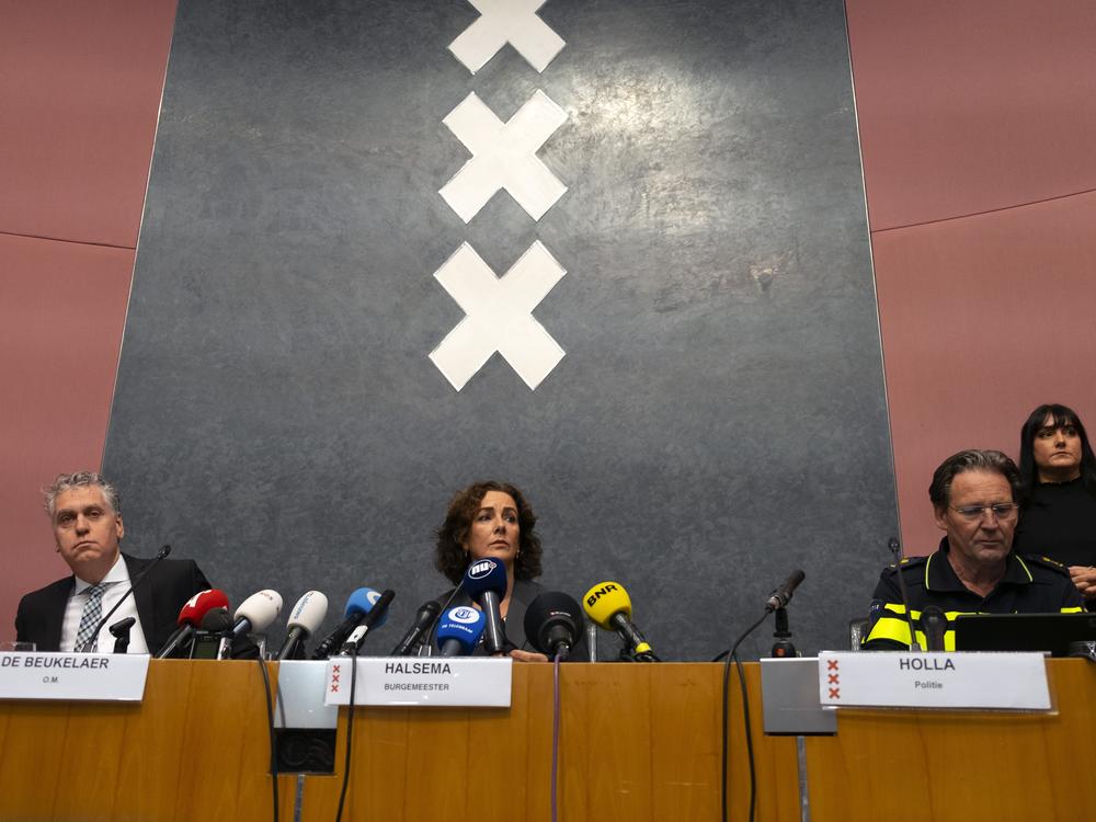 Amsterdam's Mayor Femke Halsema (center), acting Amsterdam police chief Peter Holla (left) and head of the Amsterdam public prosecutor's office René De Beukelaer hold a news conference after Israeli fans and protesters clashed overnight after a soccer match, in Amsterdam, Netherlands, Friday.