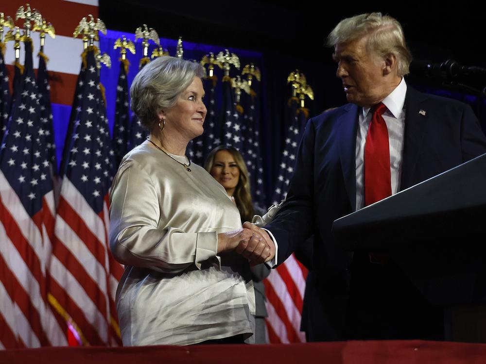 President-elect Donald Trump praises his campaign senior advisor Susie Wiles during an election night event at the Palm Beach Convention Center on Nov. 6 in West Palm Beach, Fla. Trump has asked Wiles to serve as his chief of staff when he takes office in January.