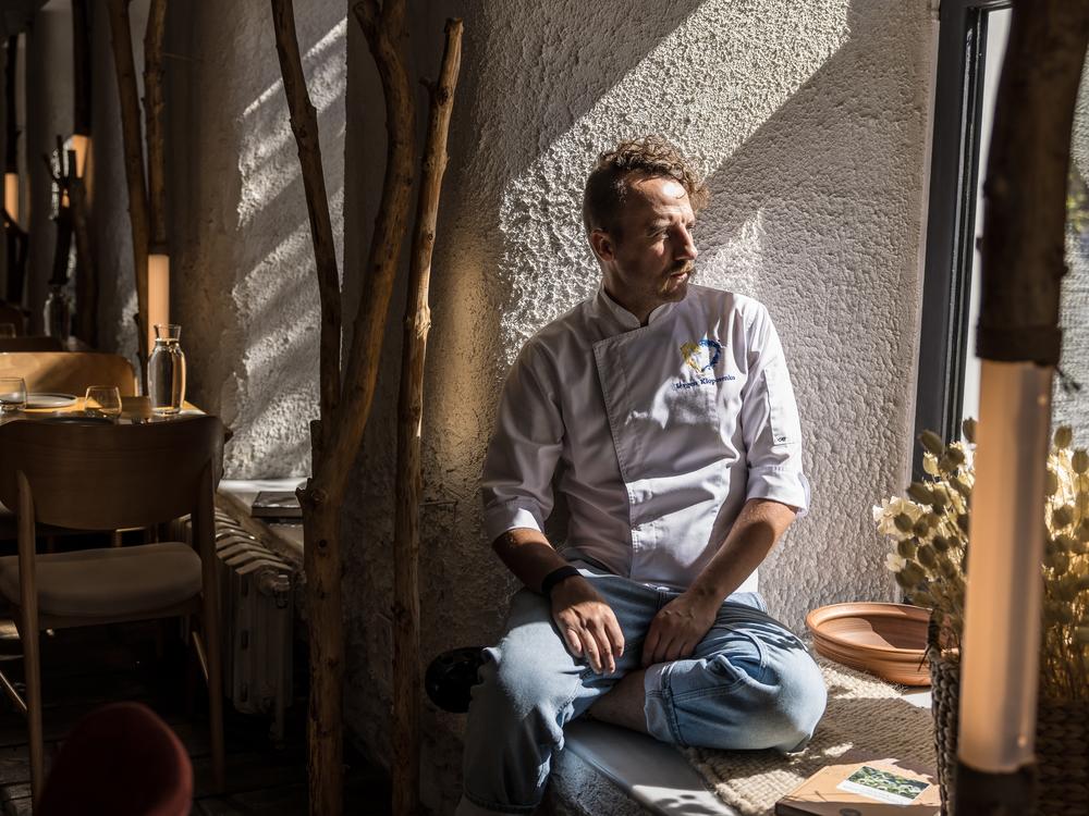 Yevhen Klopotenko, 37, Ukrainian chef and restaurateur, poses for a portrait in his restaurant 100 rokiv tomu vpered in Kyiv, Ukraine, on Aug. 14.