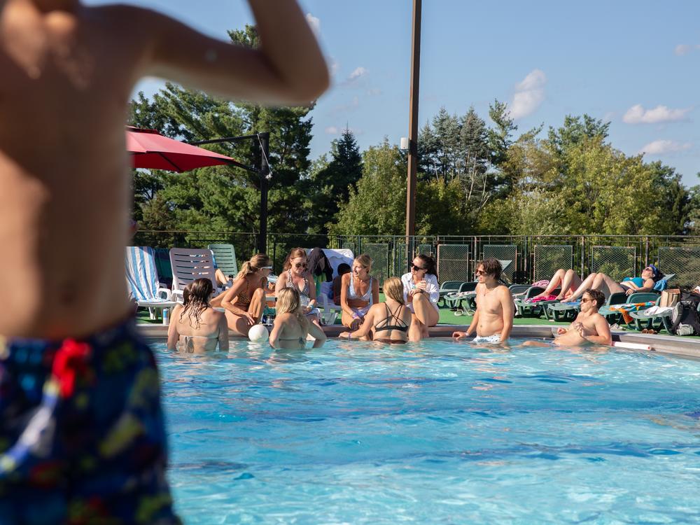 The pool is a popular hangout on sunny days and the place to cool off and debrief after playing volleyball.