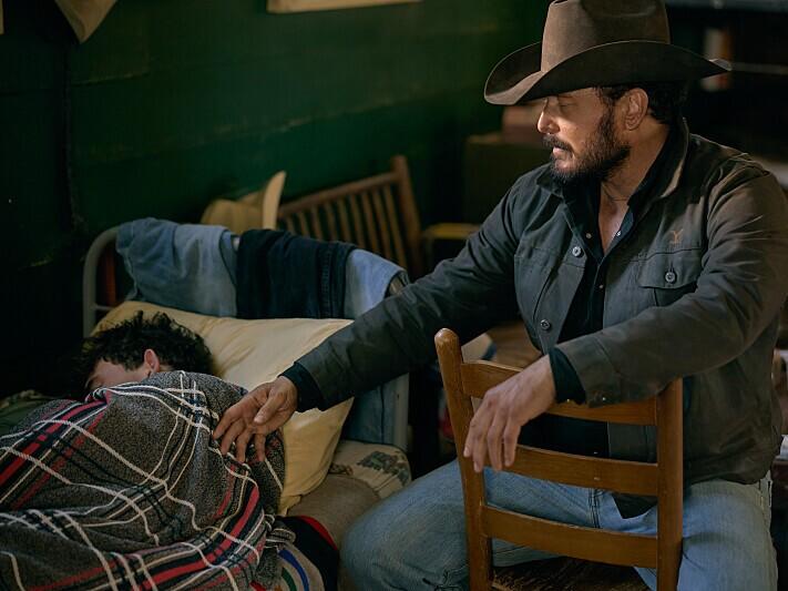 Finn Little as Carter and Cole Hauser as Rip Wheeler.