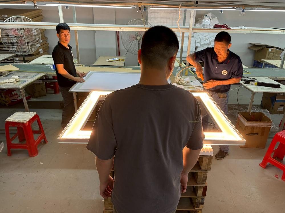 Cheng owns a company in China that makes light fixtures for export, mostly to America.