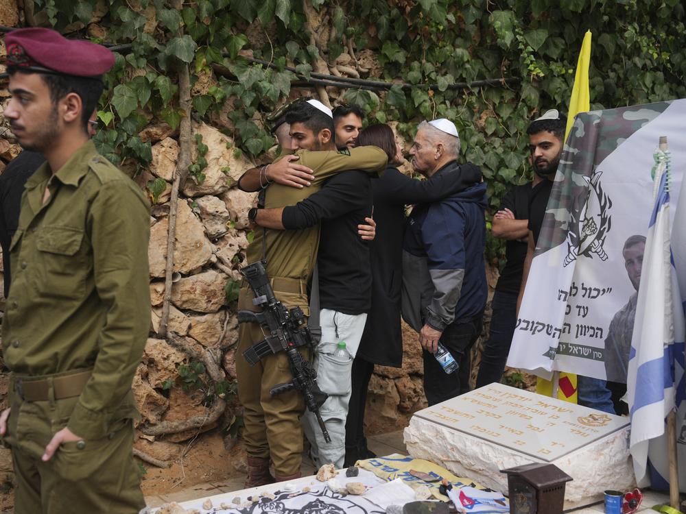 Mourners attend the funeral of Israeli soldier Orr Katz, who was killed in a battle in the Gaza Strip, at the Mount Herzl military cemetery in Jerusalem, Tuesday, Nov. 12, 2024.