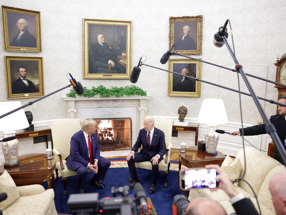 President Biden and President-elect Donald Trump hold a brief photo op at the start of their meeting in the Oval Office on Nov. 13, 2024.