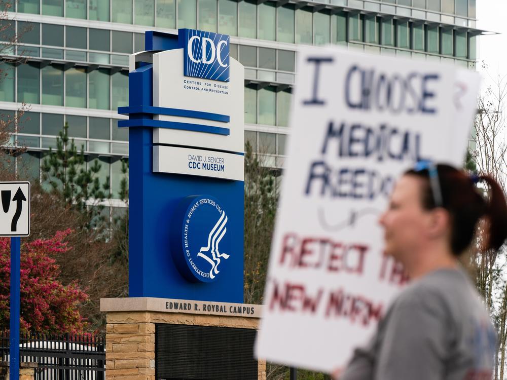 Protesters against masks, vaccines and vaccine passports march outside the headquarters of the Centers for Disease Control and Prevention in Atlanta in 2021.