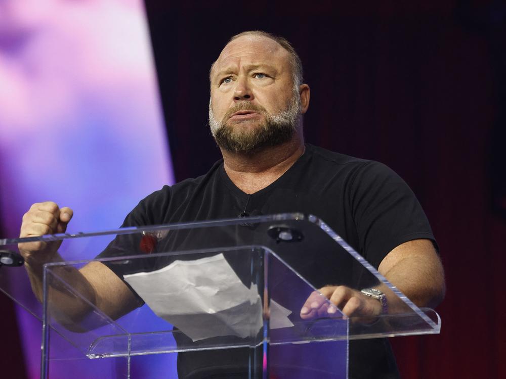 Conspiracy theorist and Infowars host Alex Jones, pictured in June, says even if his show and its parent company, Free Speech Systems, are shut down as a result of the auction, he will not be silenced.