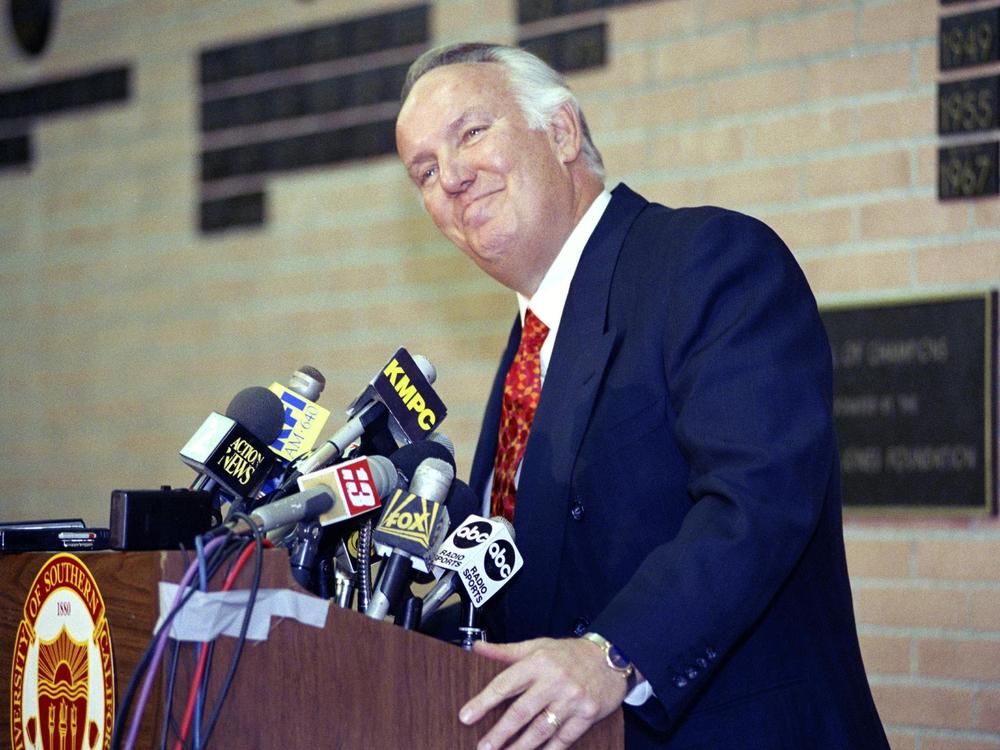 Former head coach of the Los Angeles Rams John Robinson addresses the media in Los Angeles, Jan. 3, 1992.