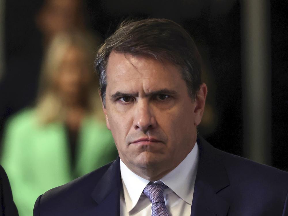 Todd Blanche listens as his client former President Donald Trump speaks as he arrives at Manhattan criminal court during jury deliberations in his criminal hush money trial in New York, May 30.