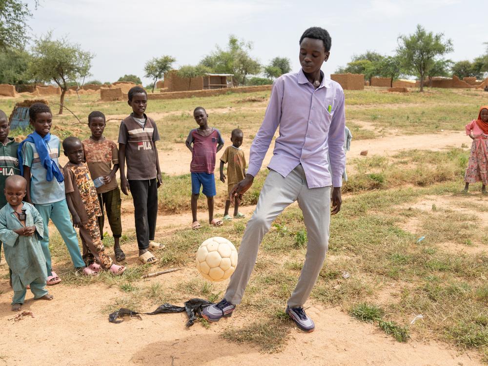 Mahawat Zakaria Jouma is happy when he gets a chance to play soccer, but mostly he is busy taking care of his siblings, trying to earn money makeing bricks, and going to school.