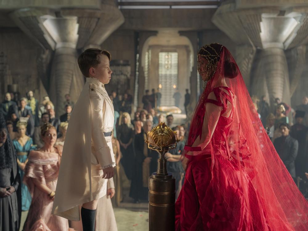 The wedding ceremony between the heir to the imperial throne, Princess Ynez Corrino (Sarah-Sofie Boussnina) and Pruwet Richese (Charlie Hodson-Prior) sets off a period of major turbulence in <em>Dune: Prophecy.</em>
