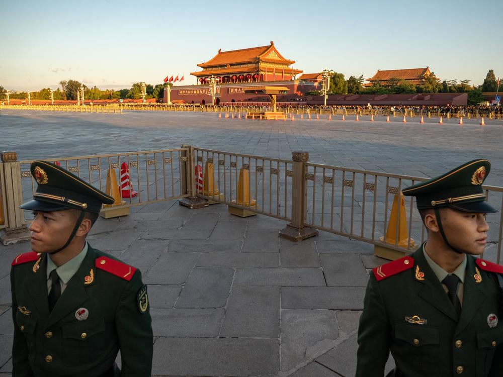 People's Liberation Army soldiers stand guard in Tiananmen Square at the end of the flag-raising ceremony marking the 75th anniversary of the founding of the People's Republic of China, in Beijing, on Oct. 1.