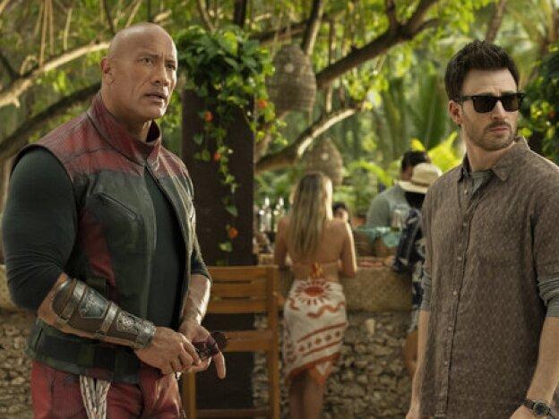 Dwayne Johnson and Chris Evans in <em>Red One</em>.