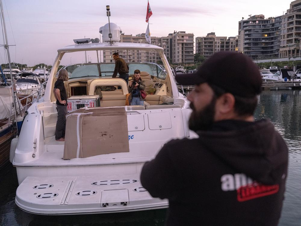 Sara the lion cub leaves via yacht at the Dbayeh sea port.