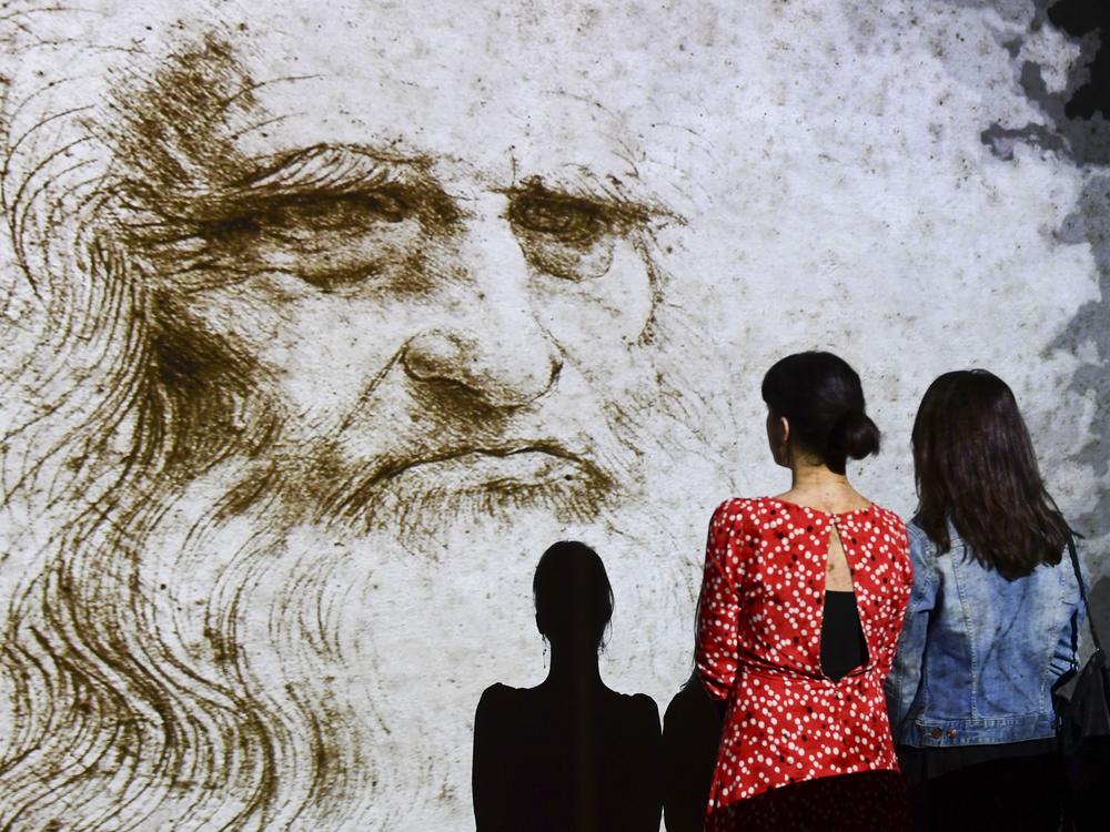 People watch a hologram called 