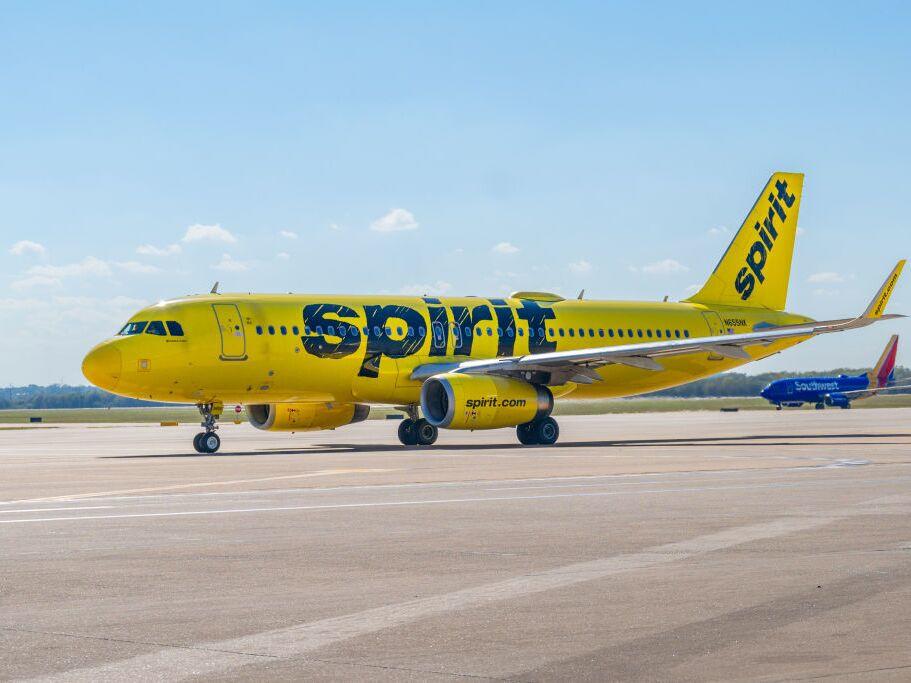 A Spirit Airlines plane prepares to depart from the Austin-Bergstrom International Airport. The low-cost carrier plans to keep flying as it files for Chapter 11 bankruptcy protection.