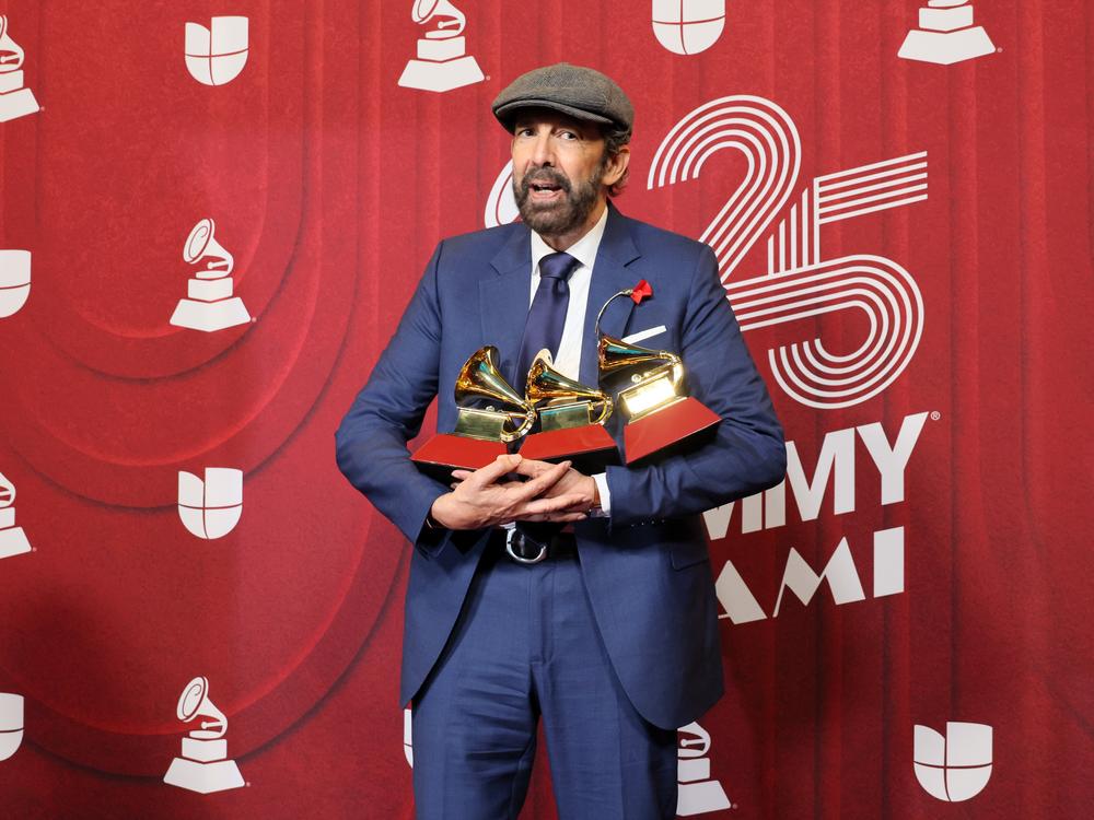 Juan Luis Guerra won both record and album of the year at the Latin Grammy Awards Thursday in Miami.