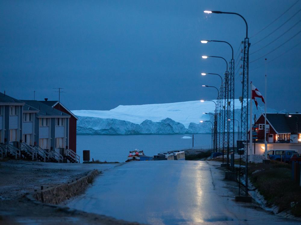 An iceberg floats off the coast of Illulisat, Greenland. Ice sheets in Greenland and Antarctica are melting rapidly, and the risks of drastic melting increase  as the Earth heats up. The melting of Greenland's ice sheet is the second-largest contributor to global sea-level rise. (The largest contributor is water expanding as it warms.)