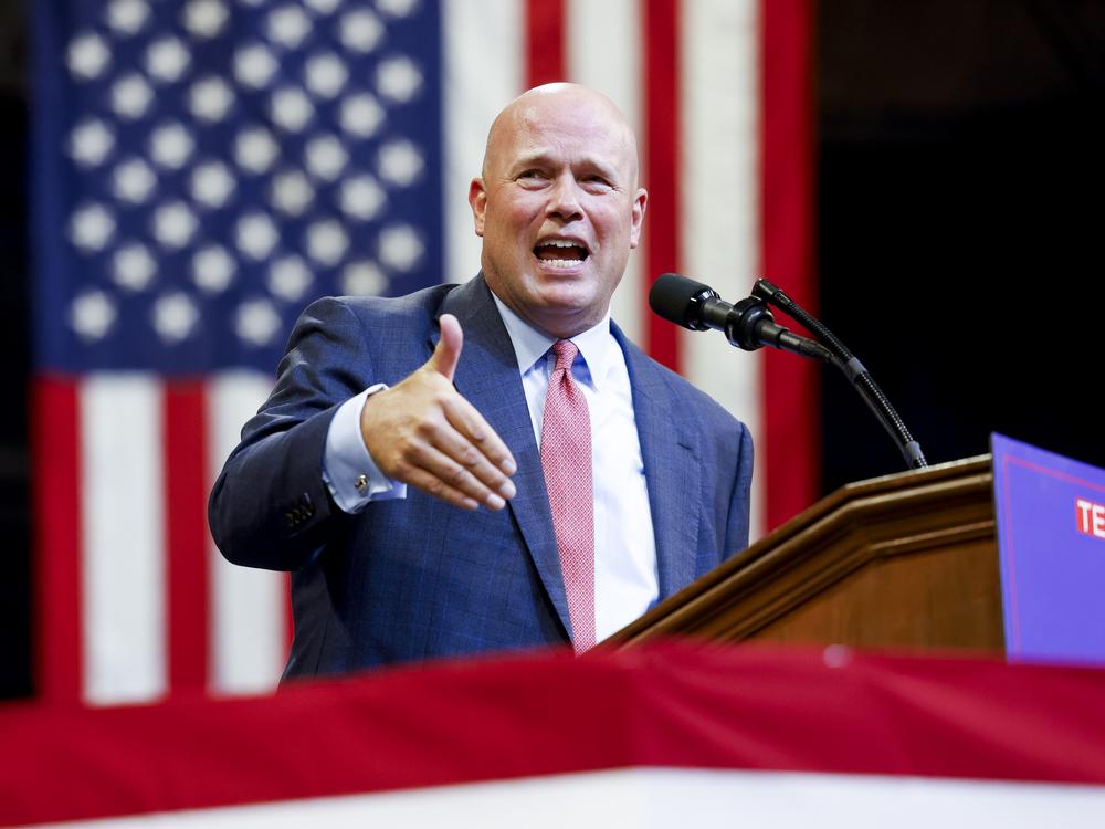 Matthew Whitaker, Trump's pick as ambassador to NATO, speaks during a Trump rally at Montana State University on Aug. 9, in Bozeman, Mt.