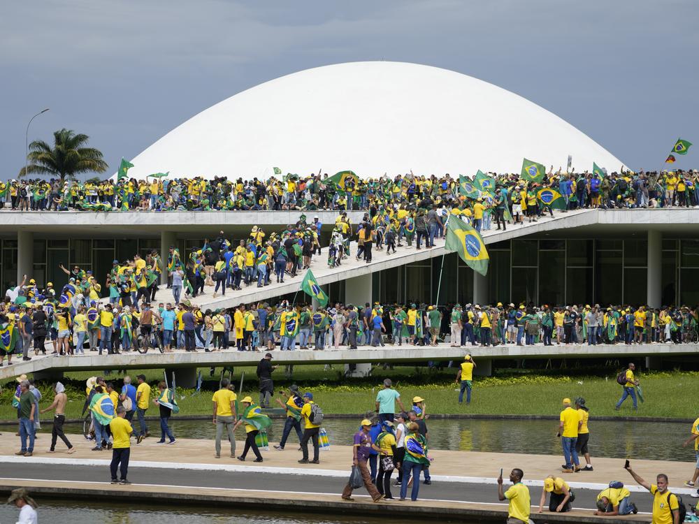 Supporters of Brazil's former President Jair Bolsonaro stormed the National Congress building, in Brasilia, Brazil, Jan. 8, 2023.