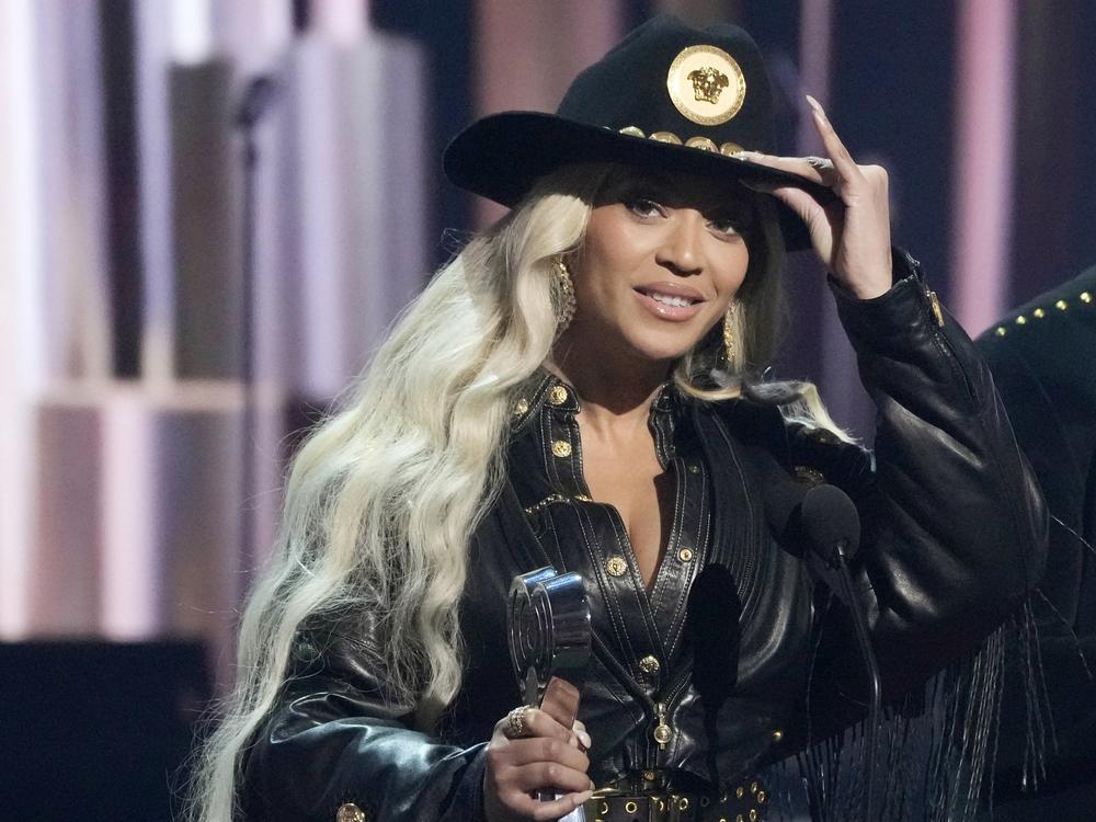 Beyoncé (left) accepts the Innovator Award during the iHeartRadio Music Awards on April 1, 2024, at the Dolby Theatre in Los Angeles.