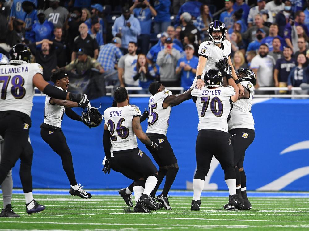 The Baltimore Ravens celebrate after kicker Justin Tucker hit a game-winning 66-yard field goal during a game in 2021. That field goal still stands as the longest ever made in the history of the NFL.